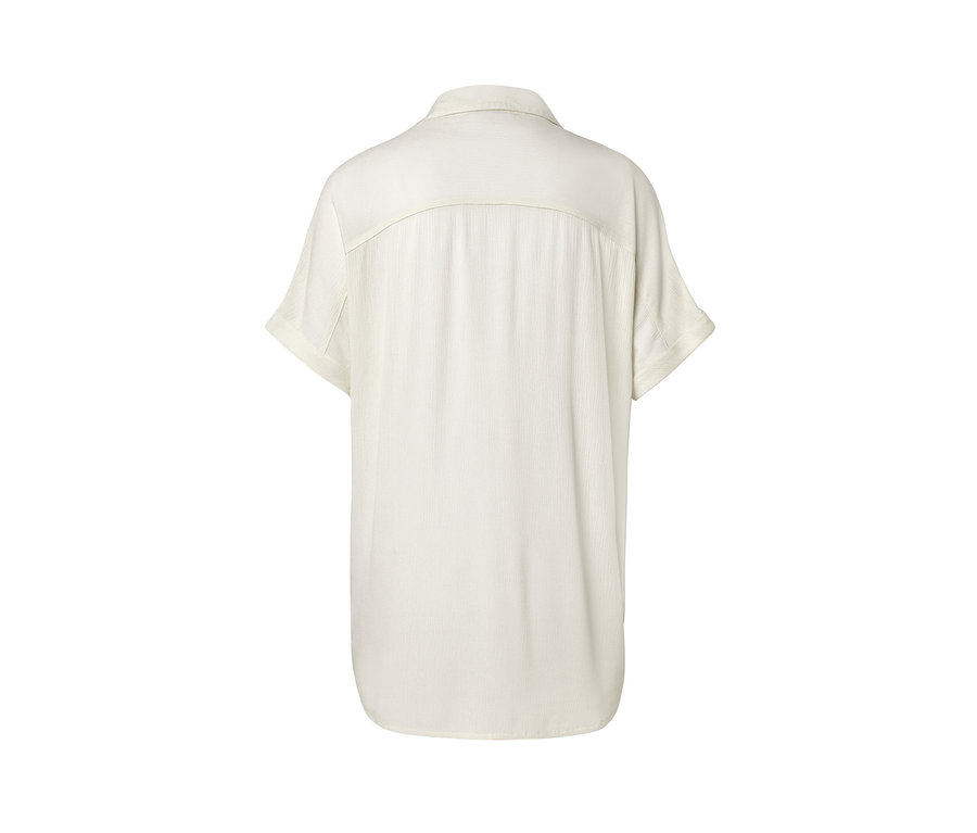 Vue arrière d'une blouse crème.
