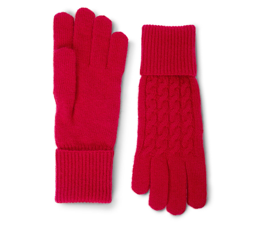 Une paire de gants tricotés rouges posés côte à côte.