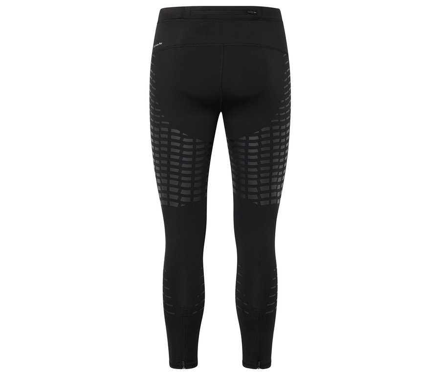 Leggings noires vues de derrière avec un motif géométrique sur les cuisses et des fermetures éclair aux chevilles.