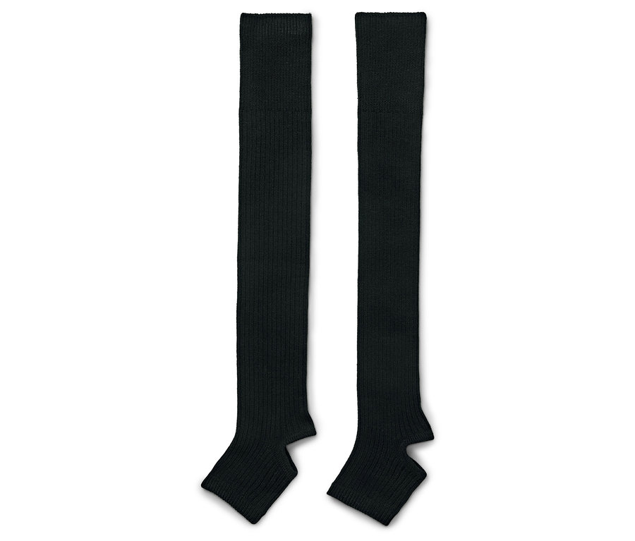 Deux jambières noires placées côte à côte sur un fond blanc.