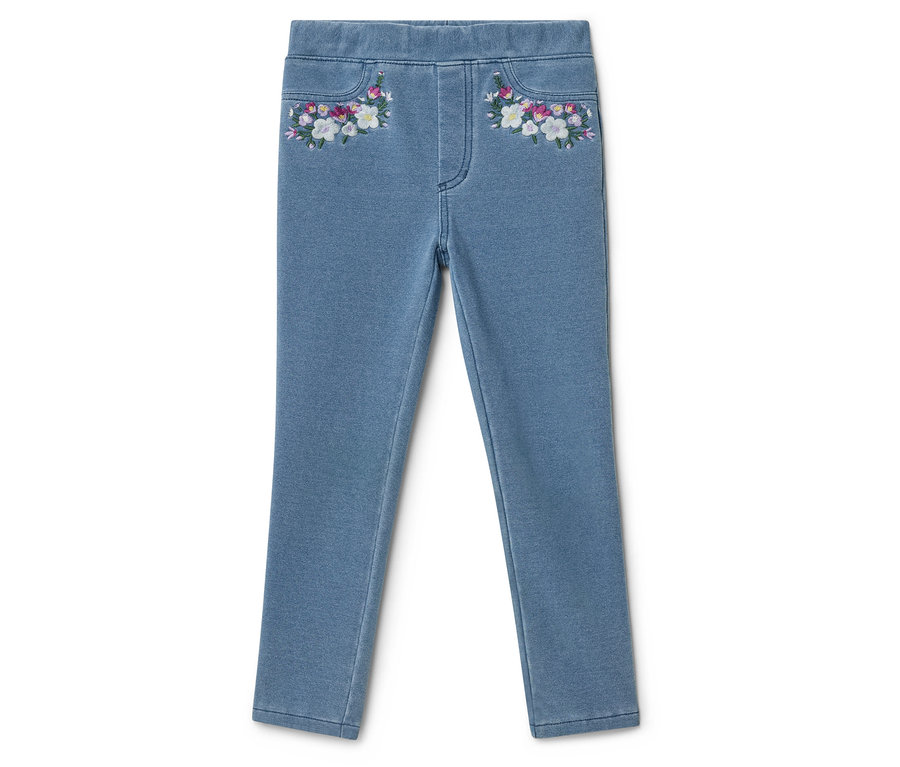 Jean clair avec broderie florale sur les poches.