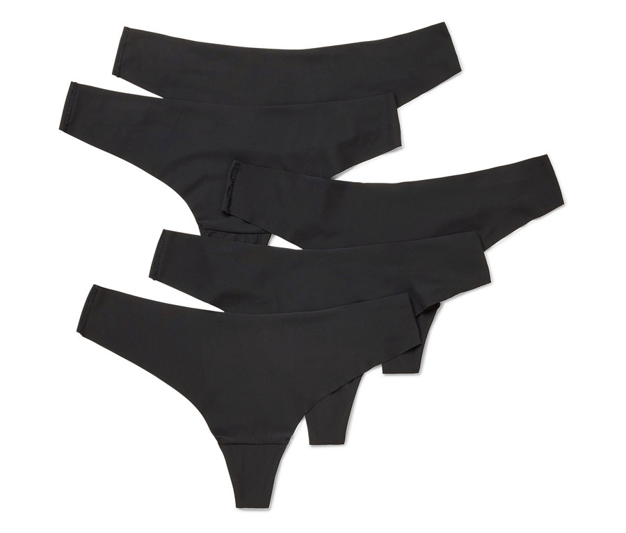 Cinq strings Magic Cut noirs sont disposés en chevauchement sur un fond blanc.