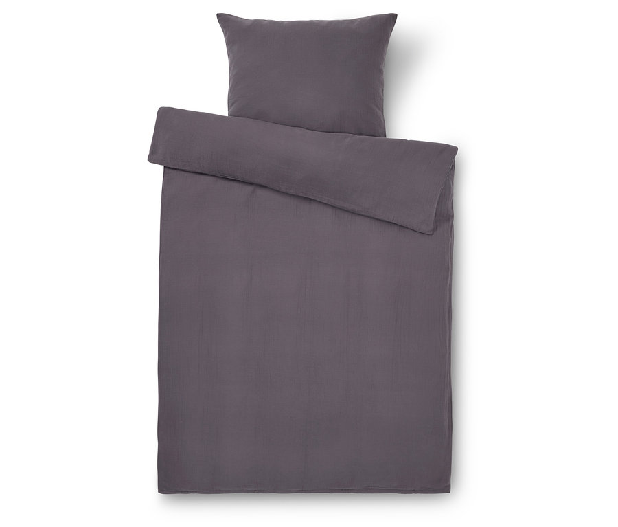 Vue de dessus d'un ensemble de literie gris comprenant une taie d'oreiller et une housse de couette.