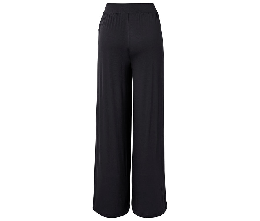 Pantalon noir large vu de dos.