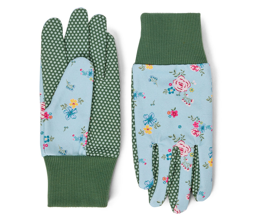 Deux gants de jardinage à fleurs avec des poignets verts sont côte à côte.