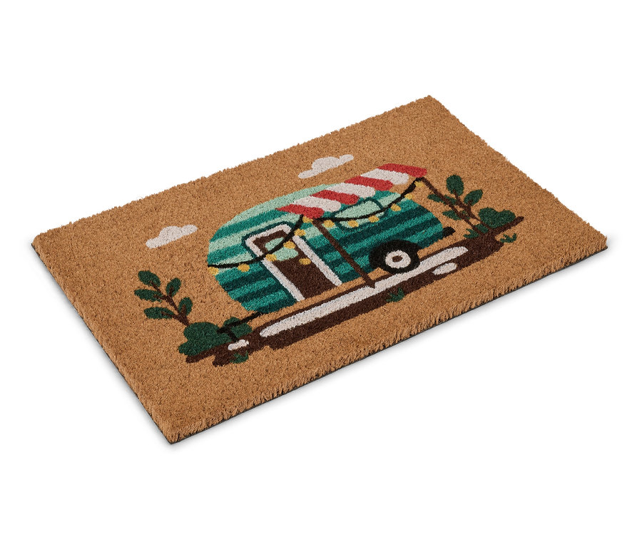 Paillasson marron avec imprimé d'un camping-car avec un auvent rayé rouge et blanc.