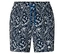 Gros plan sur un short de bain avec cordon de serrage bleu et motif floral blanc.
