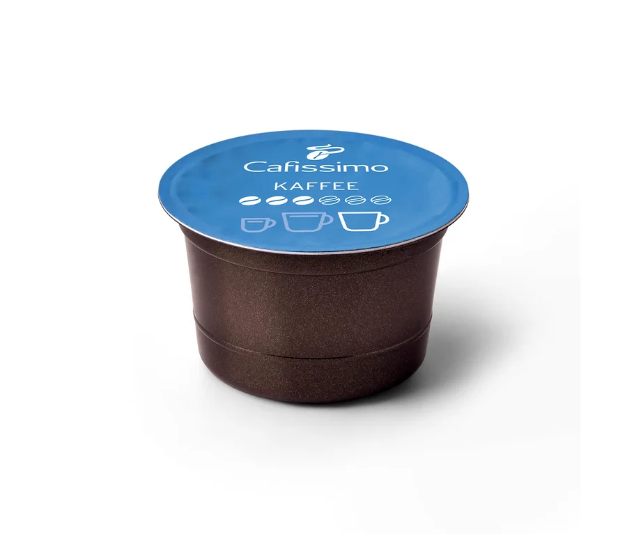Capsule de café Cafissimo marron foncé avec un couvercle bleu, affichant "Cafissimo Kaffee mild" et trois symboles de tasses.
