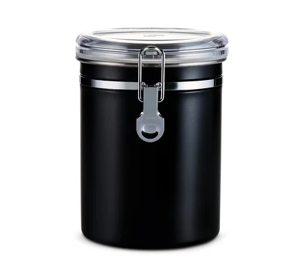 Boîte à arômes noire avec couvercle transparent.