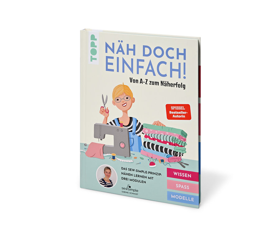 Livre « Näh doch einfach » avec un dessin d'une couturière, une machine à coudre et des tissus.