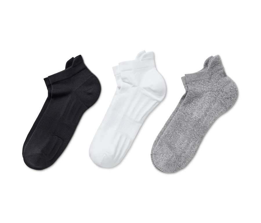 Trois paires de chaussettes de course professionnelles unisexes, noires, blanches et grises.