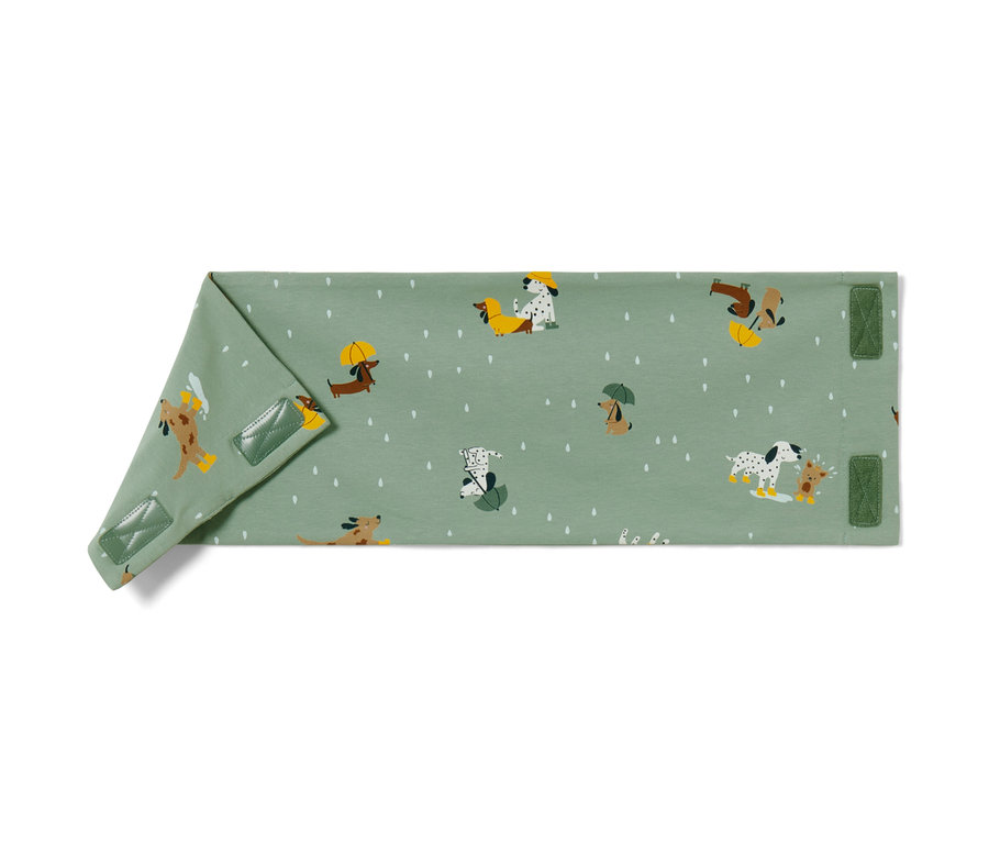 Un foulard pour enfant avec une bande auto-agrippante et un motif de chiens.