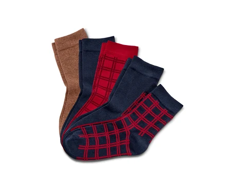 Vue détaillée de cinq paires de chaussettes de différentes couleurs et motifs.
