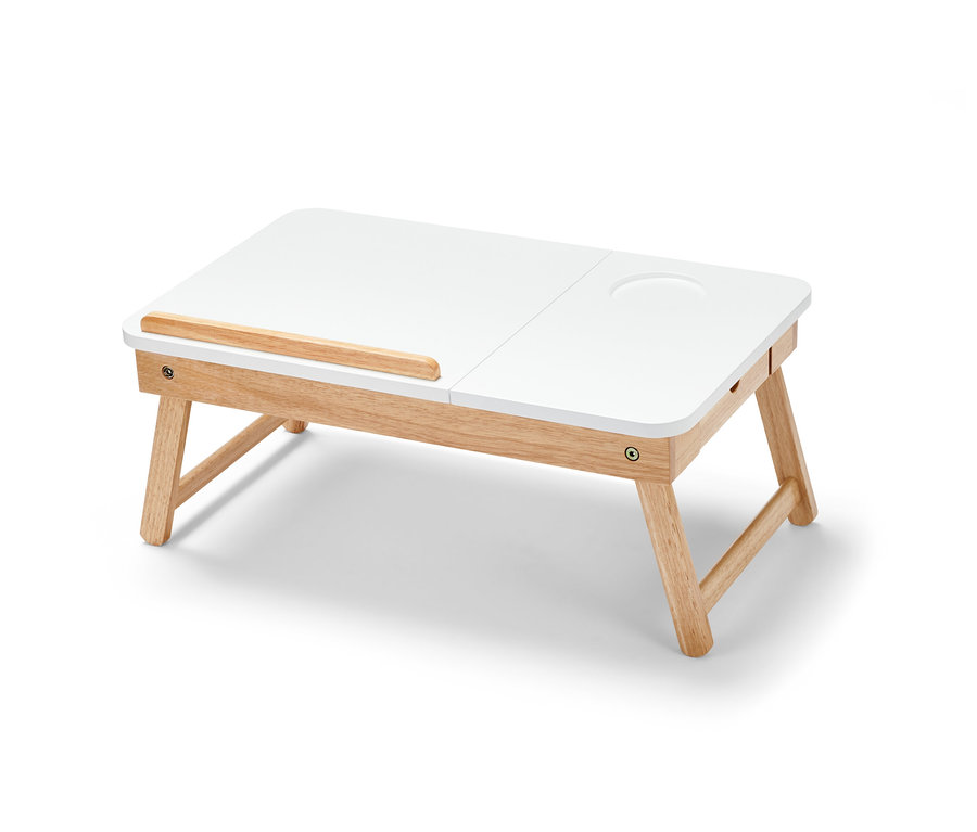 Table de lit pour ordinateur portable blanche avec pieds en bois.