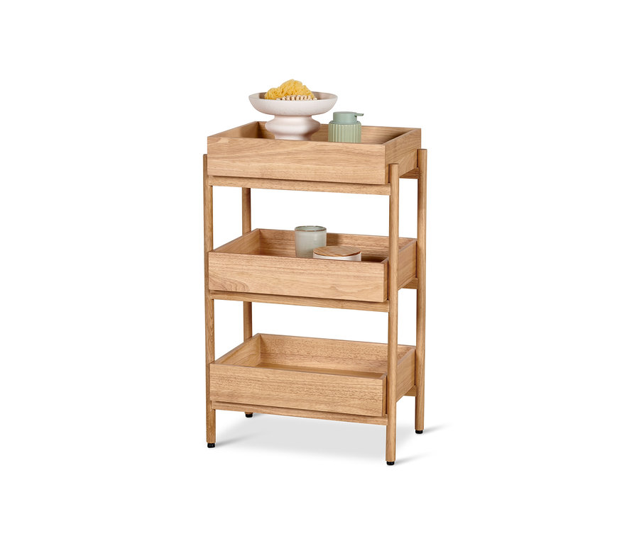 Étagère sur pieds avec 3 compartiments contenant des accessoires de salle de bain.