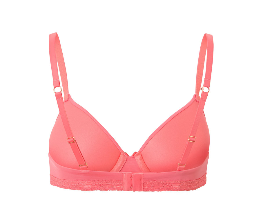 Détail d'un soutien-gorge t-shirt couleur papaye avec bretelles réglables et fermeture au dos.