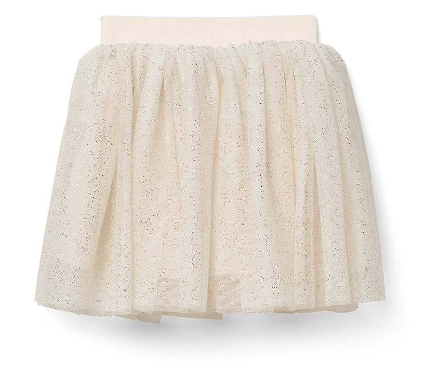 Une jupe en tulle blanche avec une ceinture élastique et des détails scintillants.
