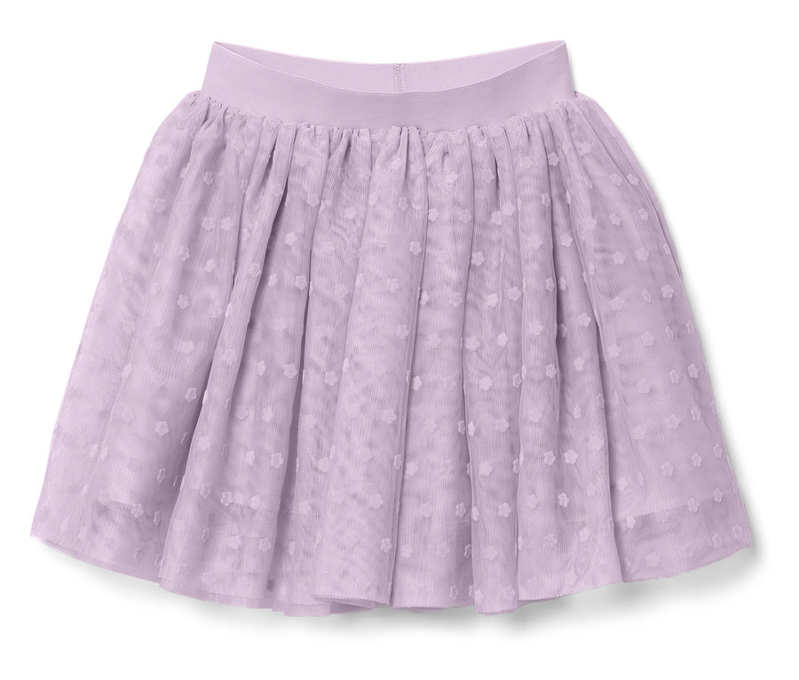 Une jupe en tulle violette avec une ceinture élastique et un motif à pois est posée sur un fond blanc.