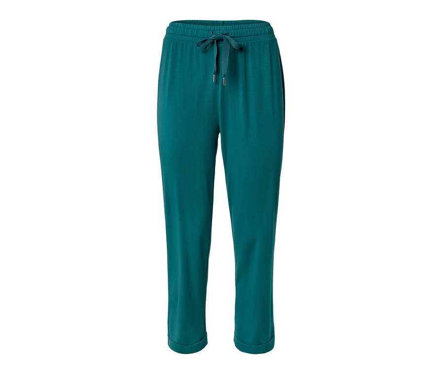 Un pantalon de pyjama vert avec cordon de serrage.