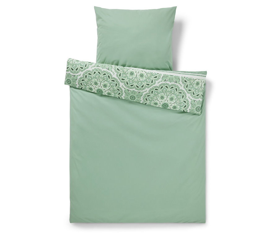 Parure de lit en renforcé verte avec motif mandala en taille double et normale, pliée.
