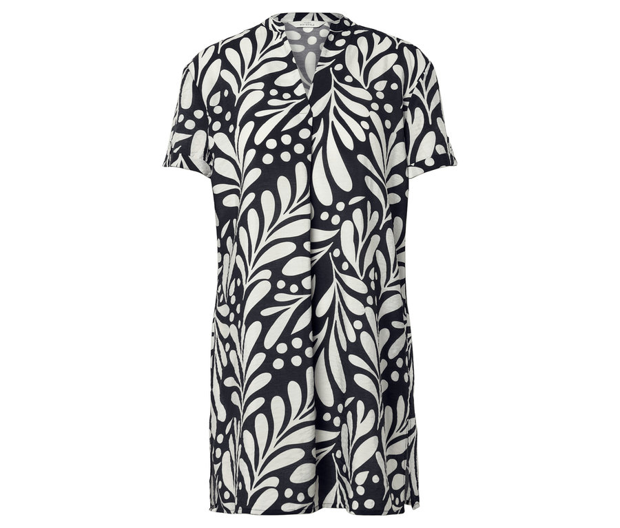 Une robe noire avec des feuilles blanches et des pois.