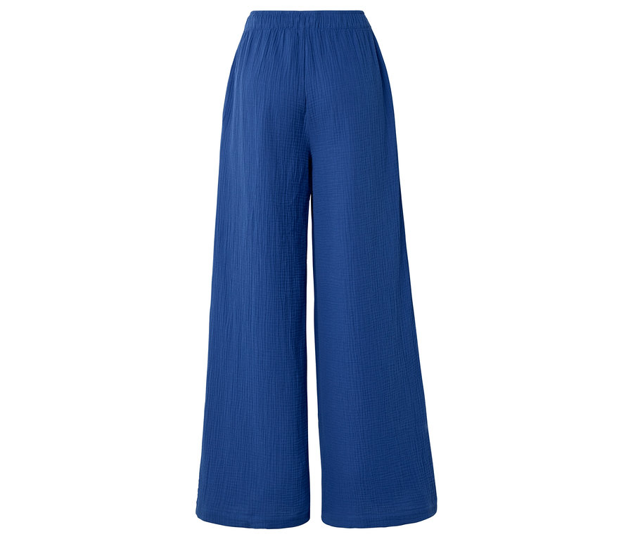 Pantalon ample bleu en tissu à jambes larges.