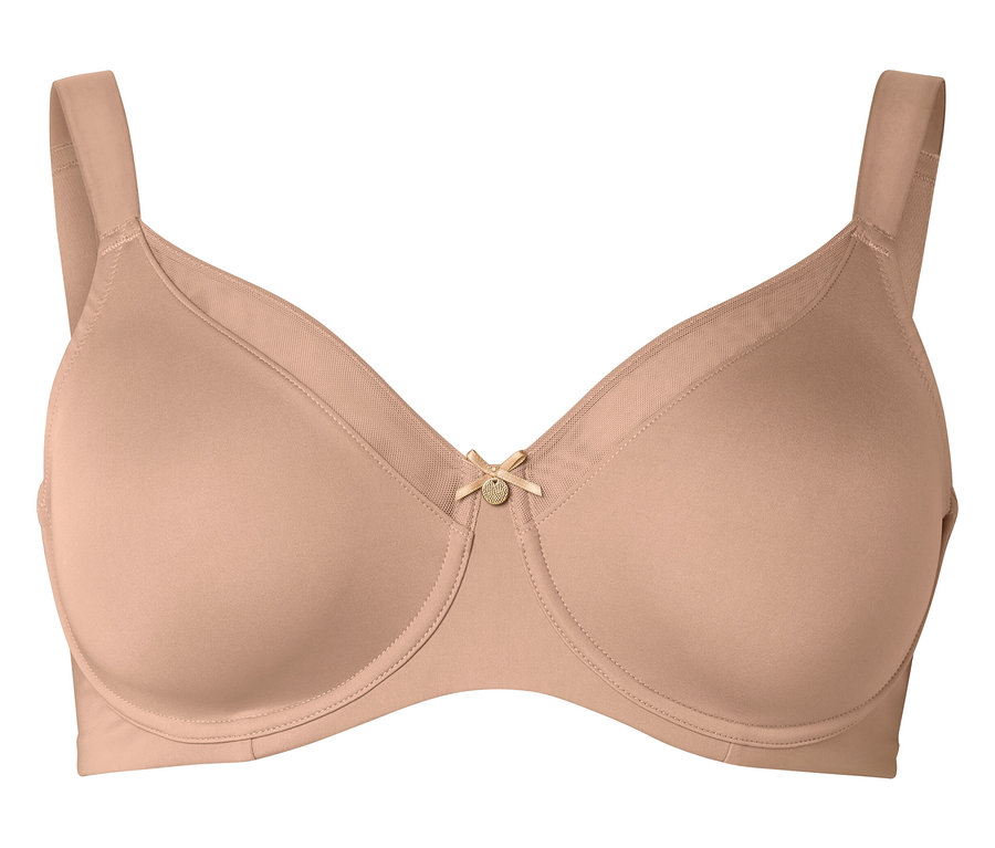 Gros plan d'un soutien-gorge couleur chair à armatures avec un petit détail de nœud au centre.
