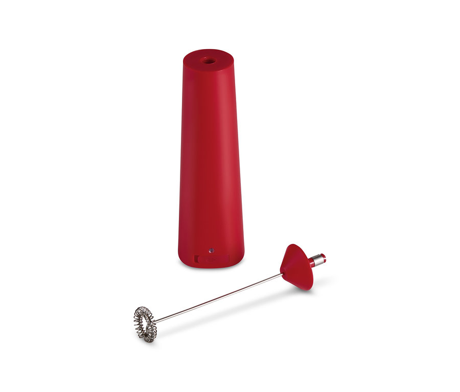Un mousseur à lait rouge à batterie rechargeable avec un fouet amovible.
