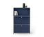 Meuble modulaire bleu foncé avec cadre chromé. La section supérieure est ouverte, montrant des livres à l'intérieur. Un vase noir nervuré et une petite bougie sont posés dessus. Deux sections fermées avec des poignées argentées sont en dessous.