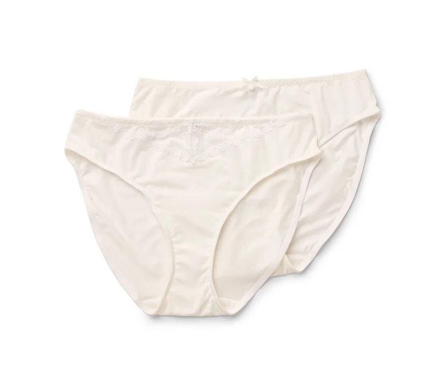 Deux culottes classiques couleur crème pour femmes avec dentelle et noeud.