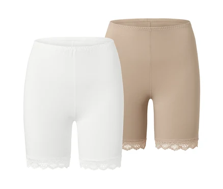 Deux cyclistes, un blanc et un couleur chair, tous deux avec de la dentelle sur les jambes.