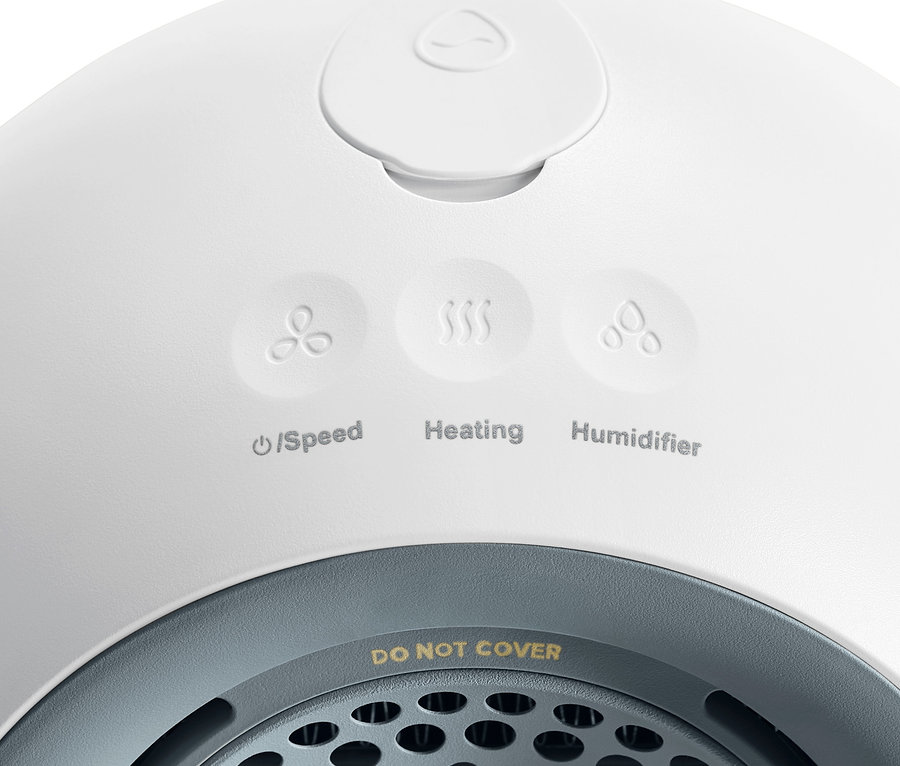 Gros plan d'un radiateur chauffant avec chauffe-mains amovible, montrant les commandes et la grille.