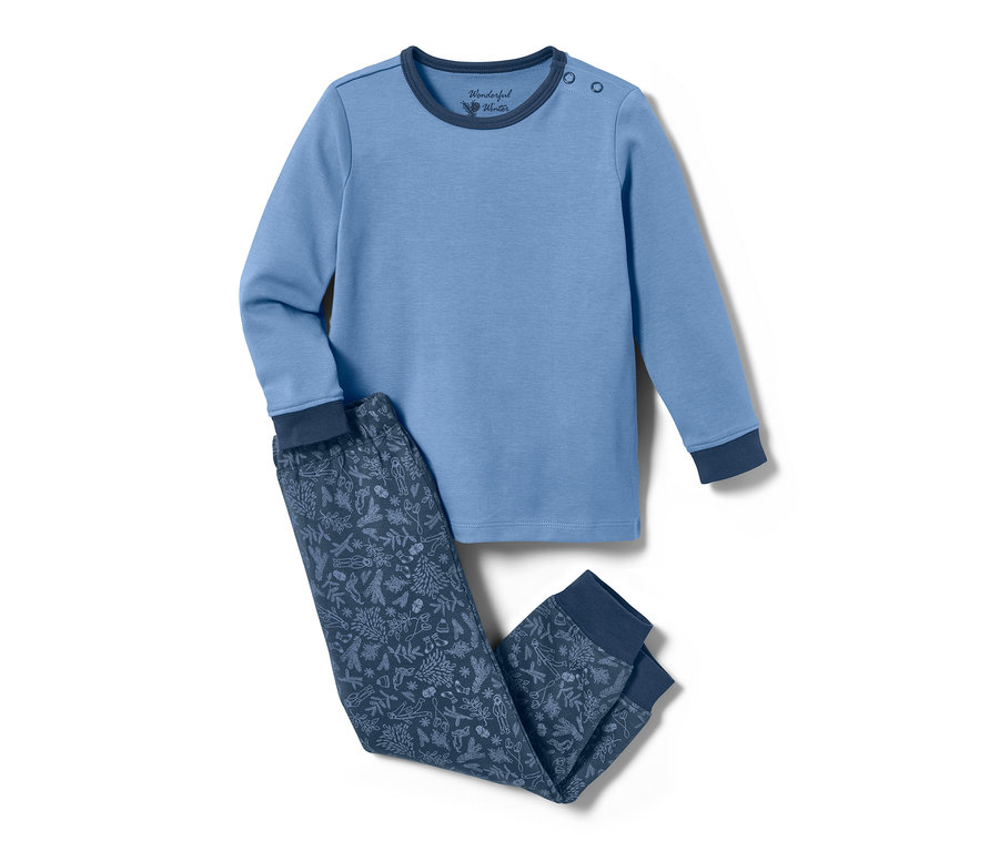 Pyjama interlock bleu pour petits enfants, haut à manches longues et pantalon imprimé.