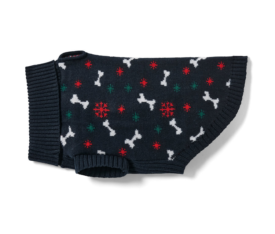 Pull pour chien bleu marine avec motif d'os et de flocons de neige.