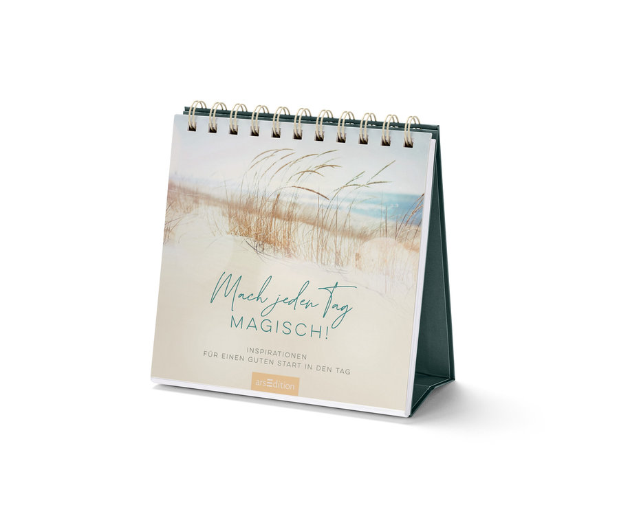 Gros plan d'un livre-présentoir de table « Mach jeden Tag magisch » (en allemand).