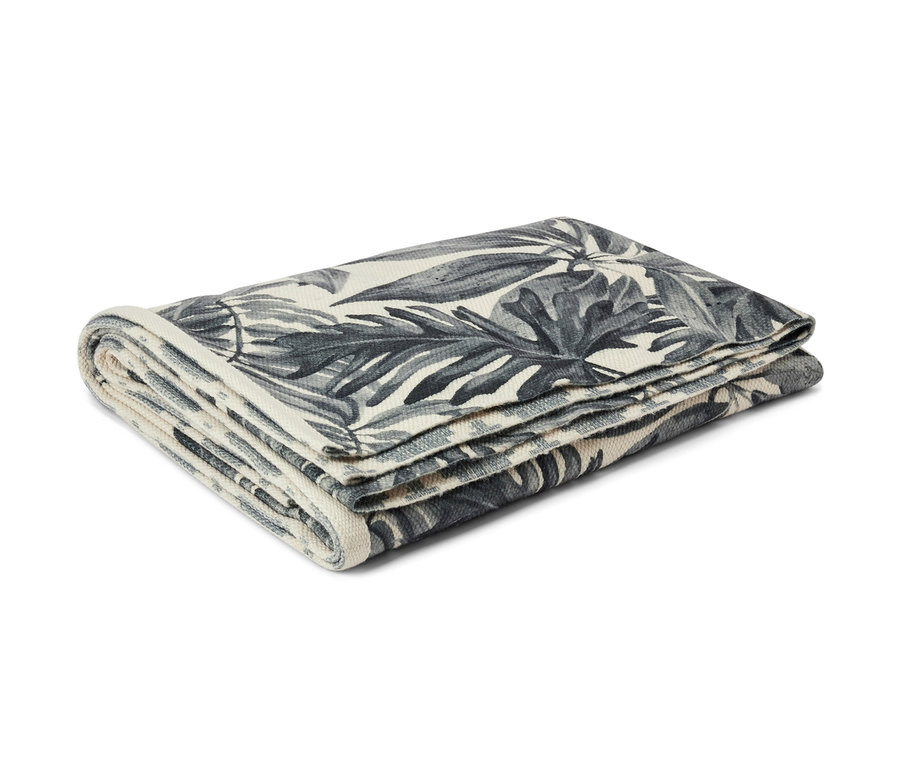 Tapis d’extérieur réversible plié, env. 250 x 180 cm, avec un motif de feuilles.