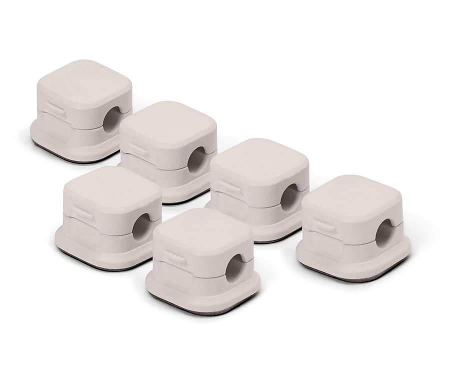 Six caches câbles blancs.