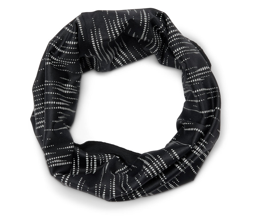 Bandeau noir avec motif à pois blancs.