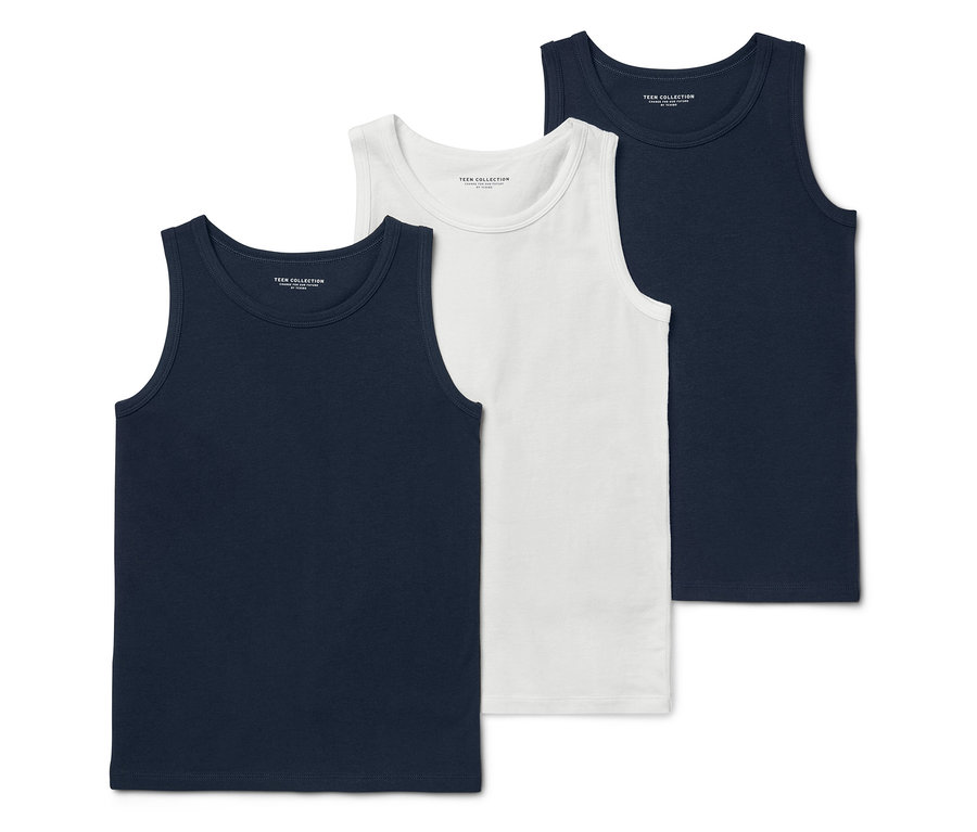 Trois débardeurs Teen Collection, deux bleu marine et un blanc, sont posés les uns sur les autres.