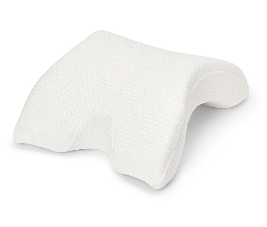 Un oreiller orthopédique blanc sur fond blanc.