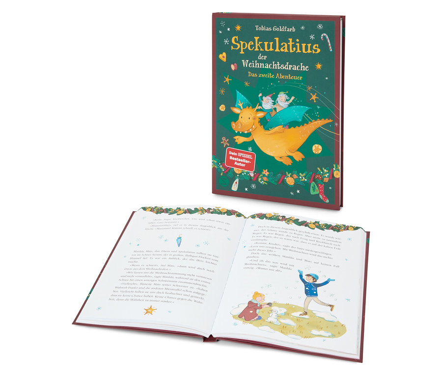 Un livre ouvert avec des illustrations à côté du livre "Spekulatius der Weihnachtsdrache".