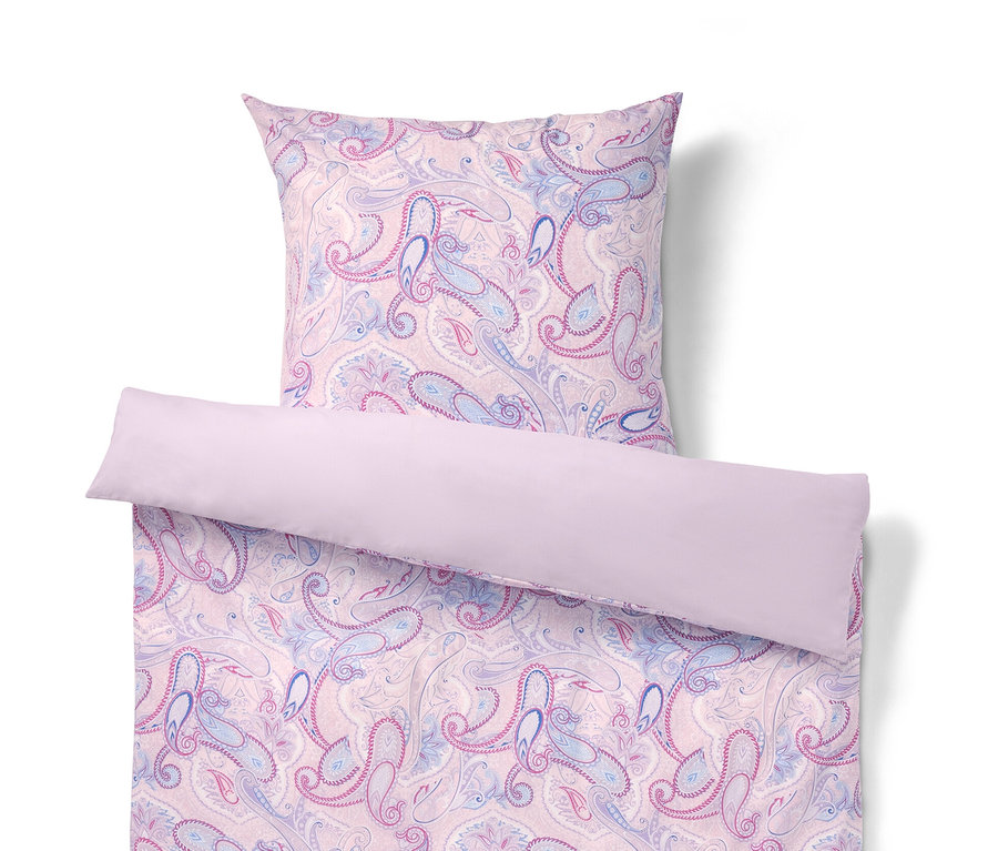 Parure de lit en renforcé rose à motif floral, une grande taille et trois tailles normales.