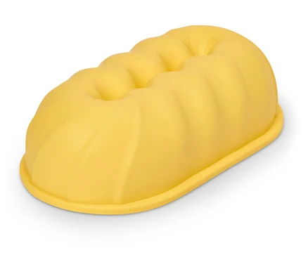 Moule à cake jaune allongé avec le dessus nervuré.