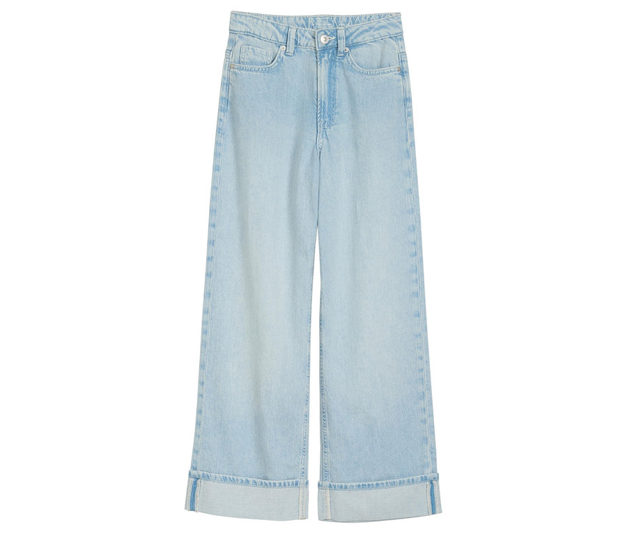 Le jeans pour enfant Tom Tailor, coupe large, avec jambe évasée est bleu clair et posé sur un fond blanc.