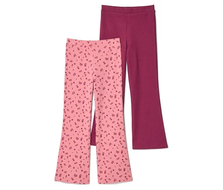 Deux pantalons évasés sont superposés, l'un rose à motifs floraux et l'autre bordeaux uni.
