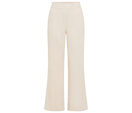Pantalon beige évasé avec taille élastique.
