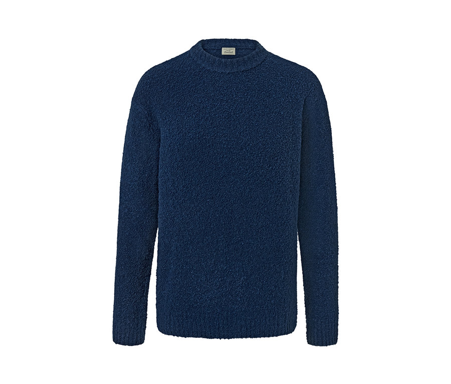 Pull en maille bleu.