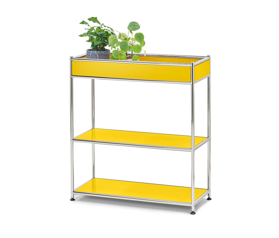 Console en métal « CN3 » jaune avec tablette et deux plantes dessus.
