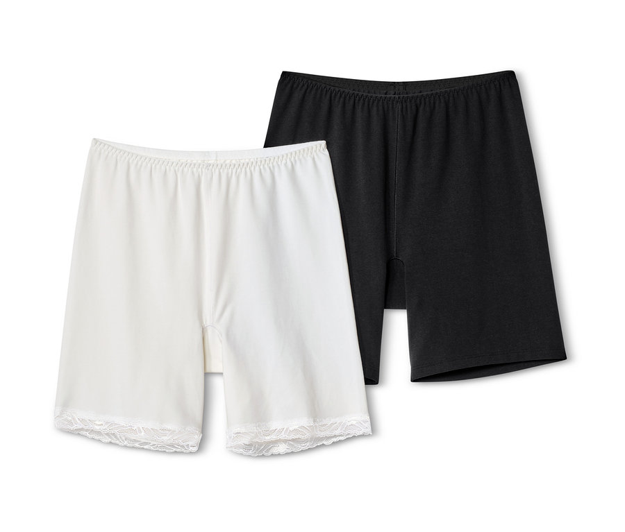 Deux shorts de cycliste, un noir, un blanc.