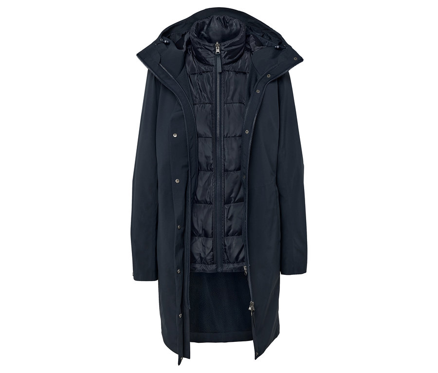 Manteau bleu marine ouvert avec capuche et gilet matelassé.